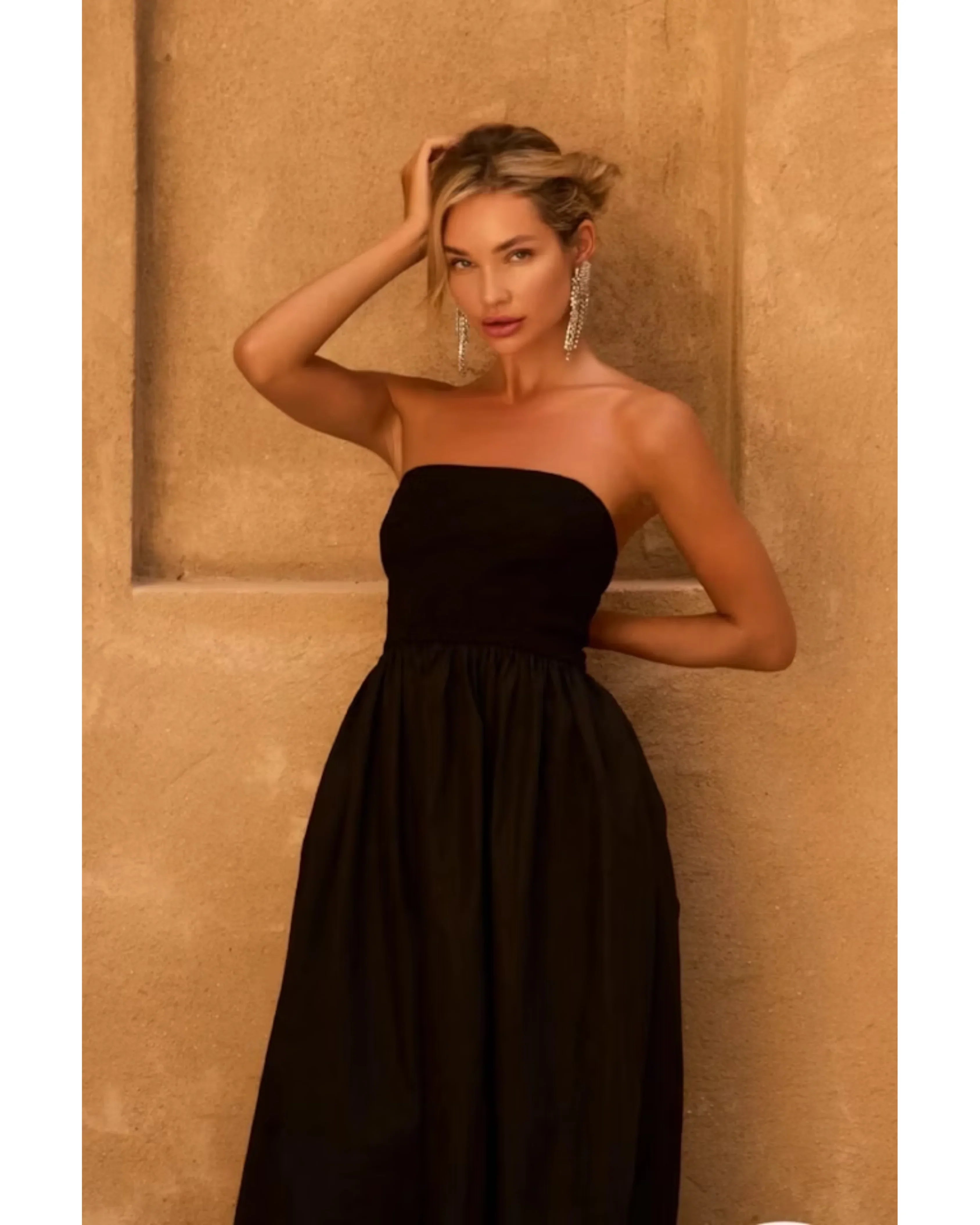 Black strapless midi dress with fitted bodice and flowing skirt — Anne Louise Boutique | Endless UAE