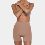 Beige booty boosting shorts with enhanced contouring design — Underhance | Endless UAE