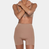 Beige booty boosting shorts with enhanced contouring design — Underhance | Endless UAE