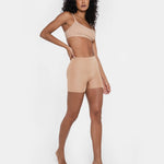 Beige booty boosting shorts with enhanced contouring design — Underhance | Endless UAE