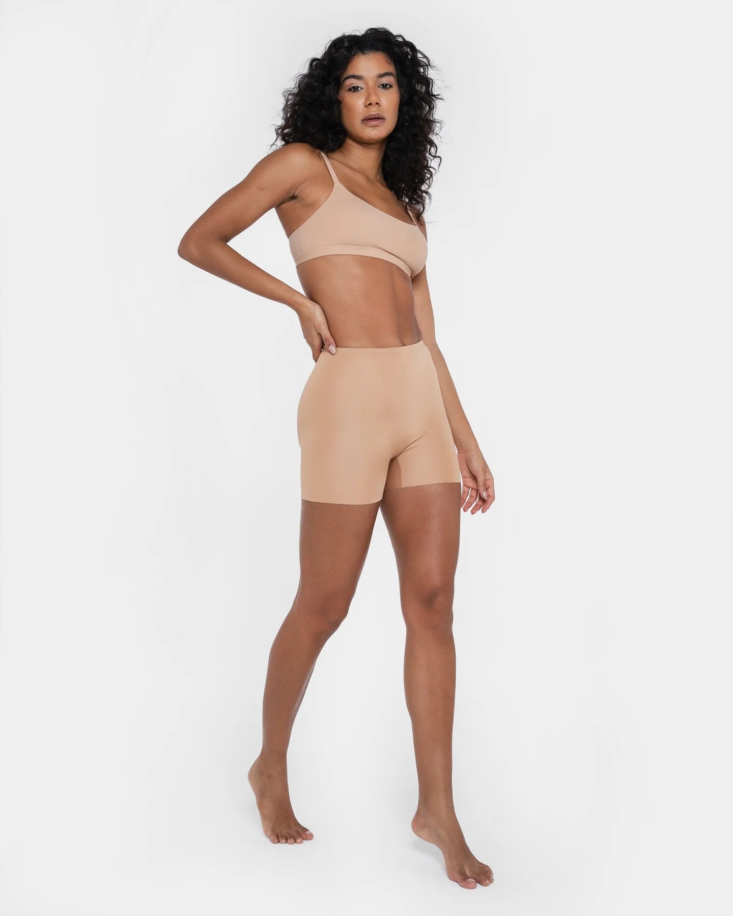 Beige booty boosting shorts with enhanced contouring design — Underhance | Endless UAE