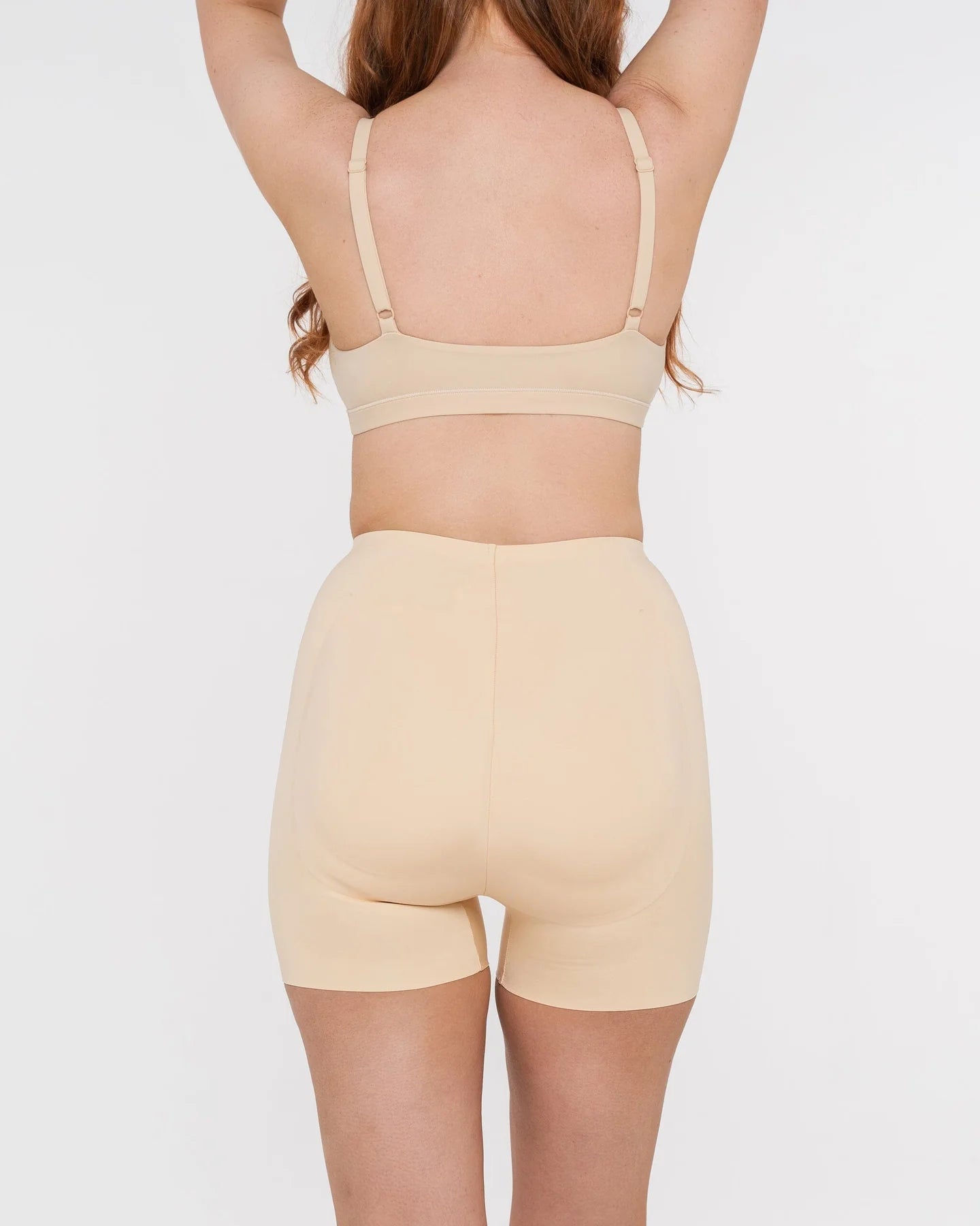 Beige booty boosting shorts with enhanced contouring design — Underhance | Endless UAE