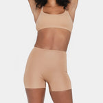 Beige booty boosting shorts with enhanced contouring design — Underhance | Endless UAE