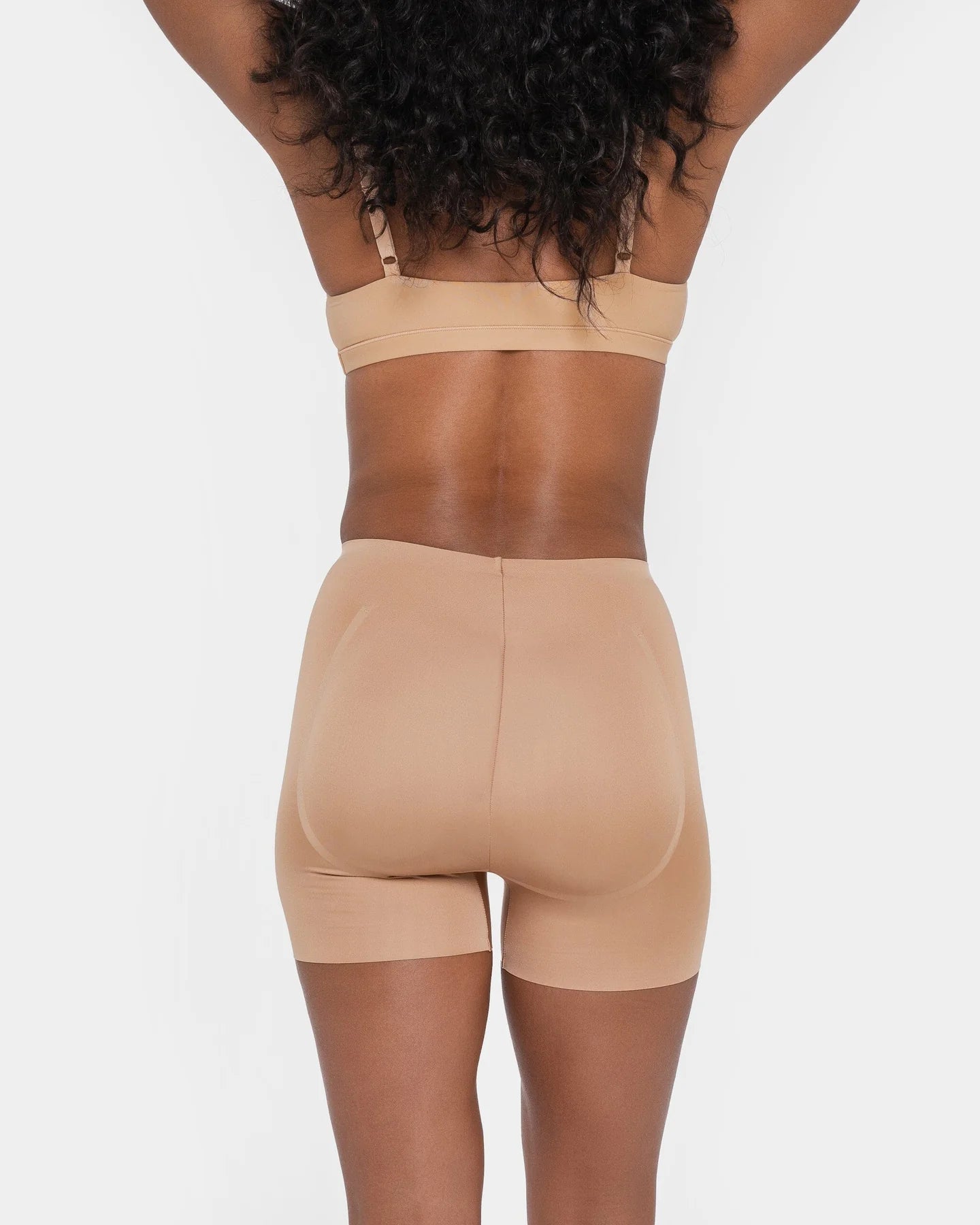 Beige booty boosting shorts with enhanced contouring design — Underhance | Endless UAE