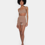 Beige booty boosting shorts with enhanced contouring design — Underhance | Endless UAE