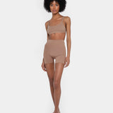 Beige booty boosting shorts with enhanced contouring design — Underhance | Endless UAE