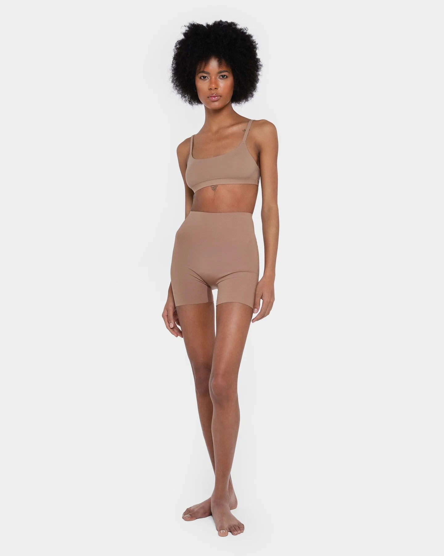 Beige booty boosting shorts with enhanced contouring design — Underhance | Endless UAE