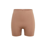 Beige booty boosting shorts with enhanced contouring design — Underhance | Endless UAE