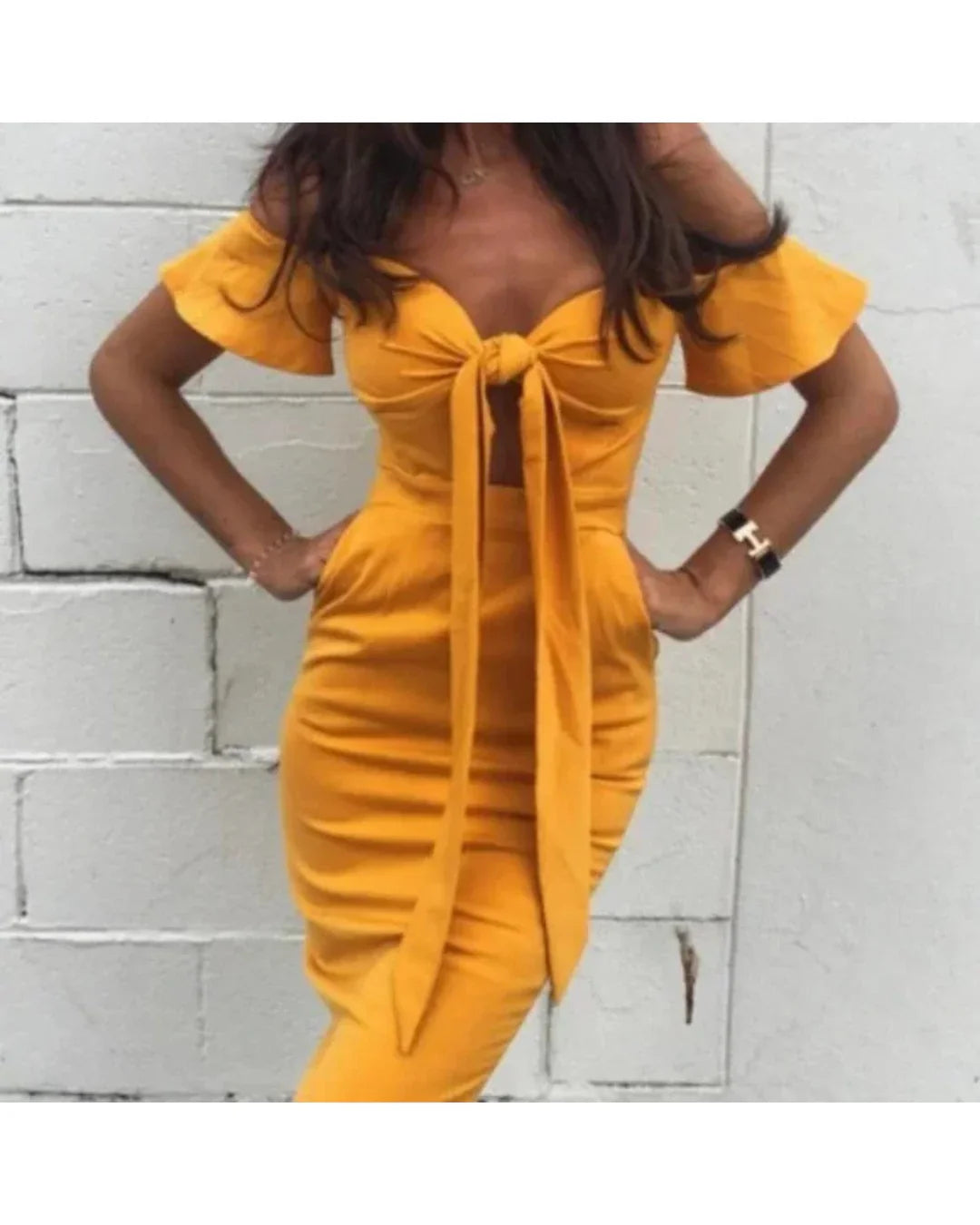 Golden yellow off-shoulder midi dress with bow detail — Runaway The Label | Endless UAE