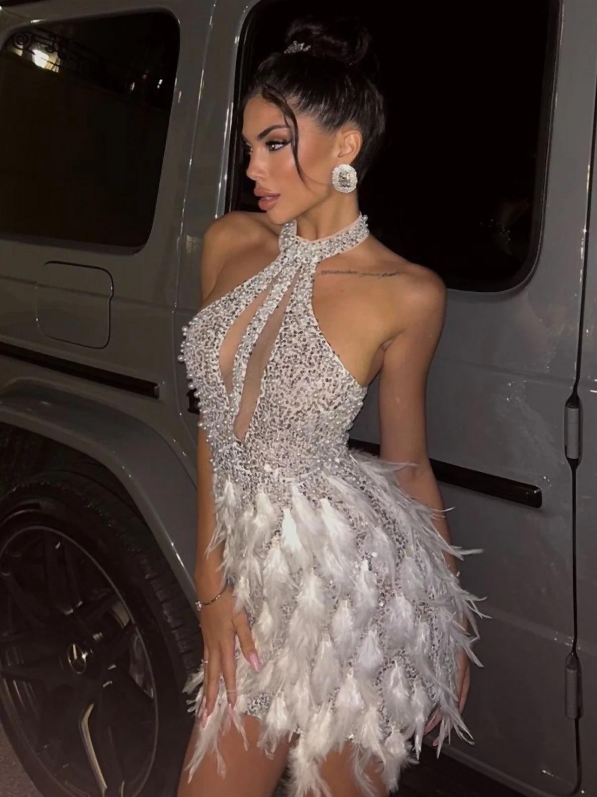 Bronte Halterneck Pearl Sequin Feather Mini Dress - Endless - UAE Rental and Resale for Women's Fashion
