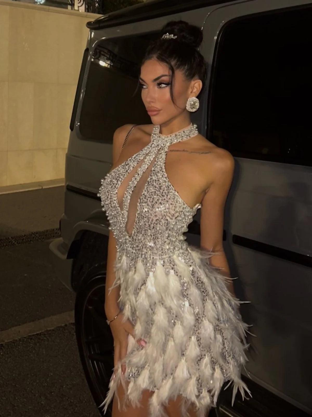 Bronte Halterneck Pearl Sequin Feather Mini Dress - Endless - UAE Rental and Resale for Women's Fashion