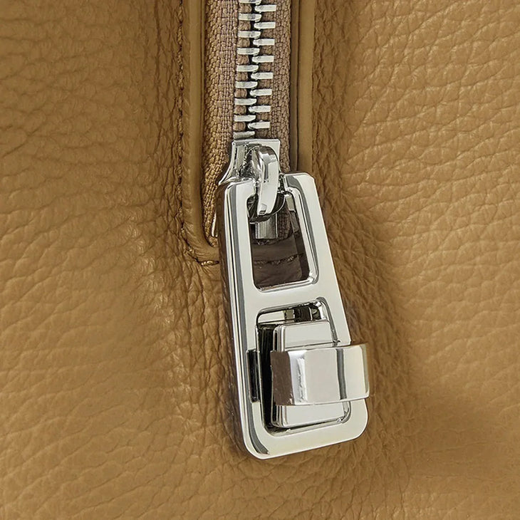 Beige leather tote bag with dual handles and minimalist design — Coccinelle | Endless UAE