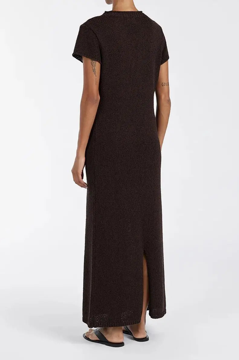 Woman wearing dark brown ribbed knit midi dress with short sleeves and front slit — DISSH | Endless UAE