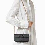 Black leather VLOGO chain wallet with gold hardware — Valentino | Endless UAE