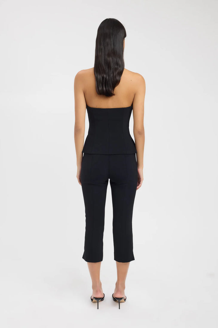 Woman wearing black strapless top and capri pants set, back view — Kookai | Endless UAE