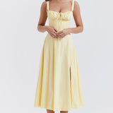 Pale yellow bustier sundress with corset bodice, sweetheart neckline, and flowing midi skirt — House of CB | Endless UAE
