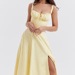 Pale yellow bustier midi dress with corset bodice, spaghetti straps, and high slit skirt — House of CB | Endless UAE