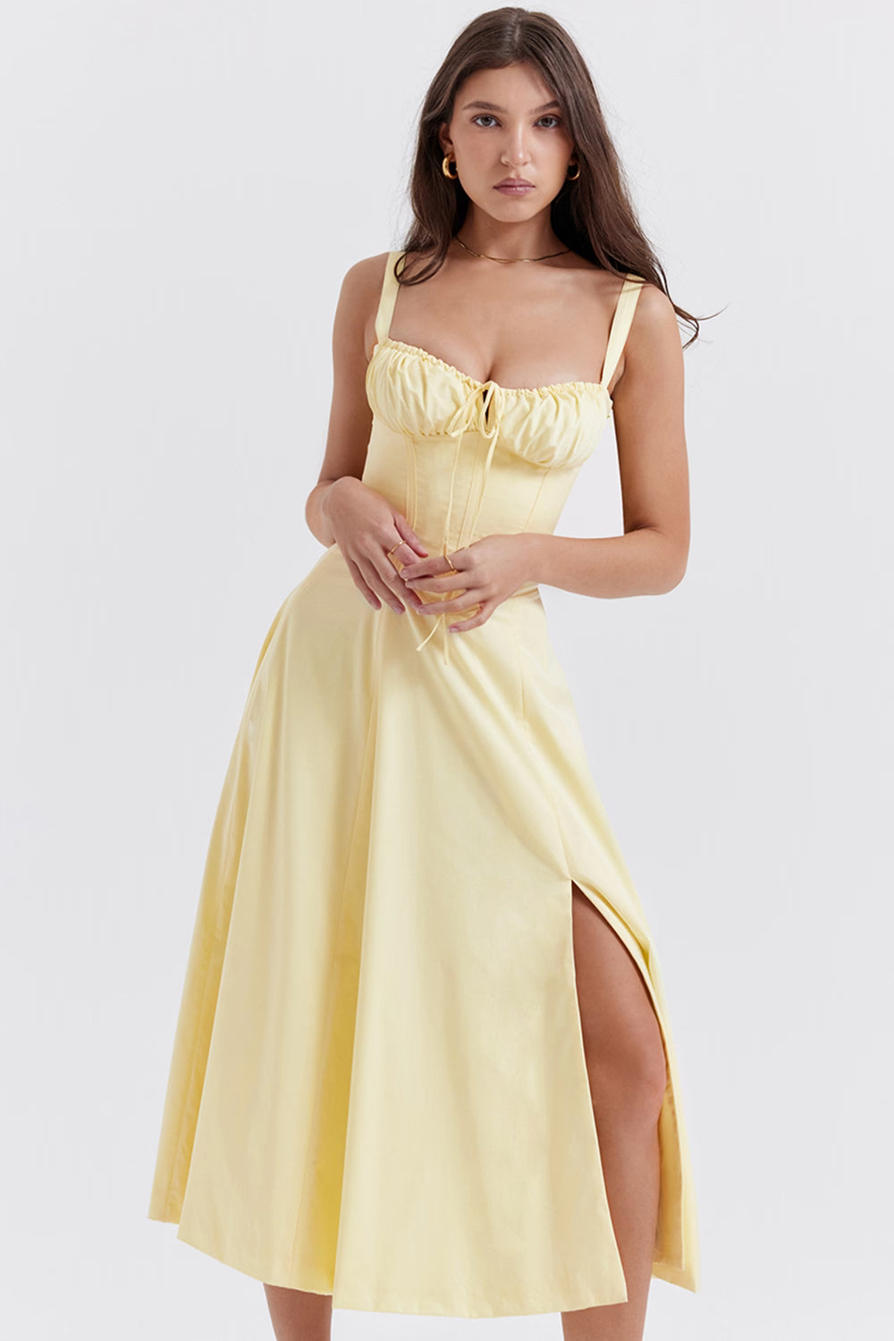 Pale yellow bustier midi dress with corset bodice, spaghetti straps, and high slit skirt — House of CB | Endless UAE
