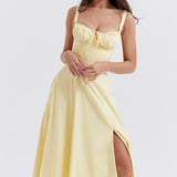 Pale yellow bustier midi dress with corset bodice, spaghetti straps, and high slit skirt — House of CB | Endless UAE