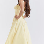 Elegant yellow bustier sundress with ruched bodice and flared midi skirt — House of CB | Endless UAE