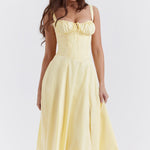 Pale yellow bustier sundress with corset bodice and flowing midi skirt — House of CB | Endless UAE