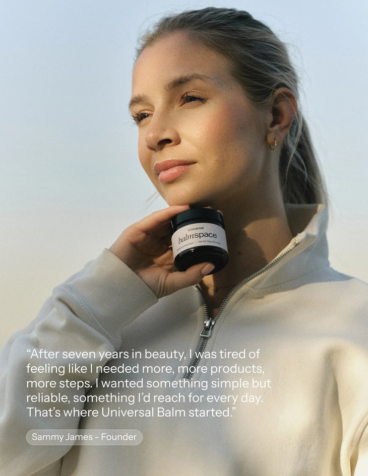 Woman holding Universal multi-purpose balm jar outdoors with founder quote about simple, reliable skincare — Balm Space | Endless UAE