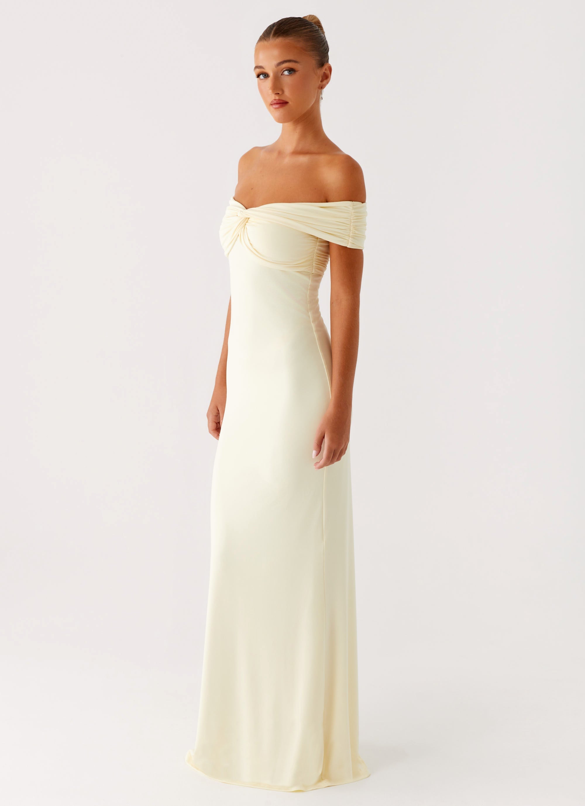 Cream off-shoulder maxi dress with ruched detailing and fitted silhouette — Peppermayo | Endless UAE