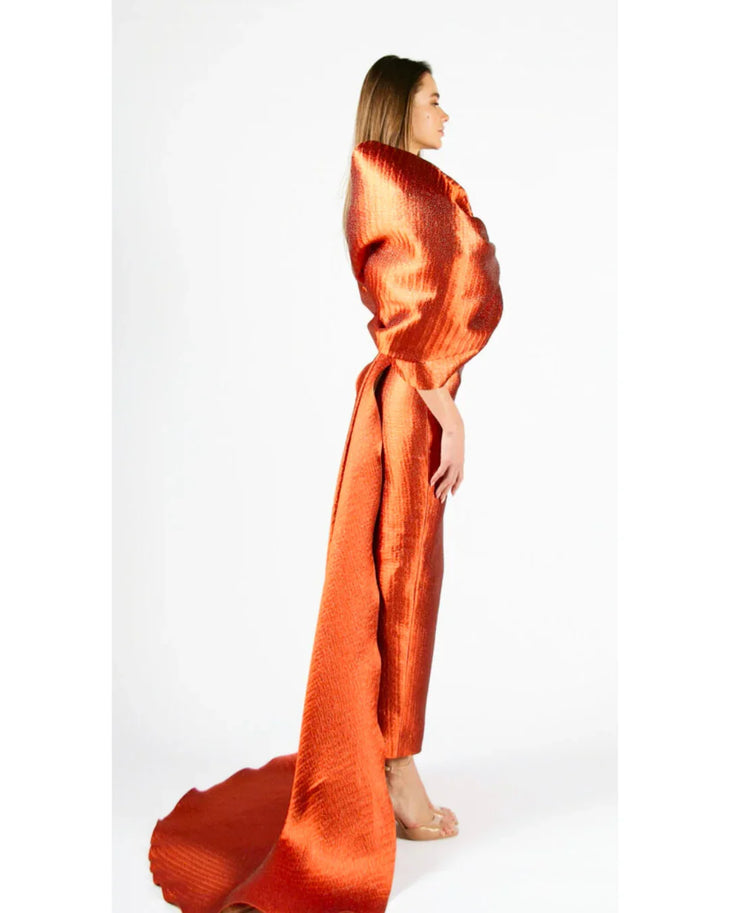Woman wearing vibrant orange Grace 3D Shoulder Bow gown with dramatic back tail — Anaya Collection | Endless UAE