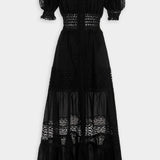 Black maxi dress with lace panels, puff sleeves, smocked waist and tiered skirt — Charo Ruiz Ibiza | Endless UAE
