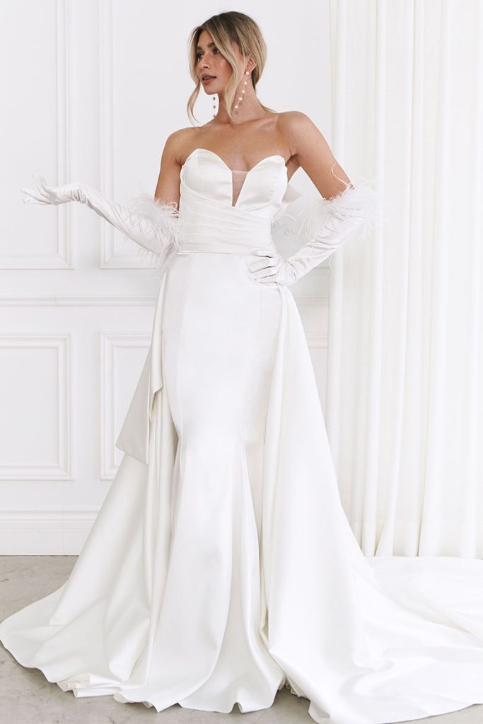 Elegant strapless white mermaid wedding gown with sweetheart neckline and dramatic train — You&I Bridal | Endless UAE