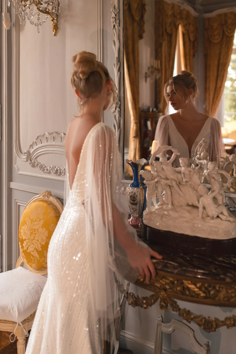 Embellished mermaid wedding dress with flowing cape and plunging neckline — Katy Corso Glen | Endless UAE