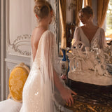 Embellished mermaid wedding dress with flowing cape and plunging neckline — Katy Corso Glen | Endless UAE