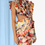 Colorful floral mini dress with ruffled cap sleeves and wrap waist detail — Zimmermann | Endless UAE