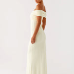 Cream off-shoulder maxi dress with ruched detailing and fitted silhouette — Peppermayo | Endless UAE