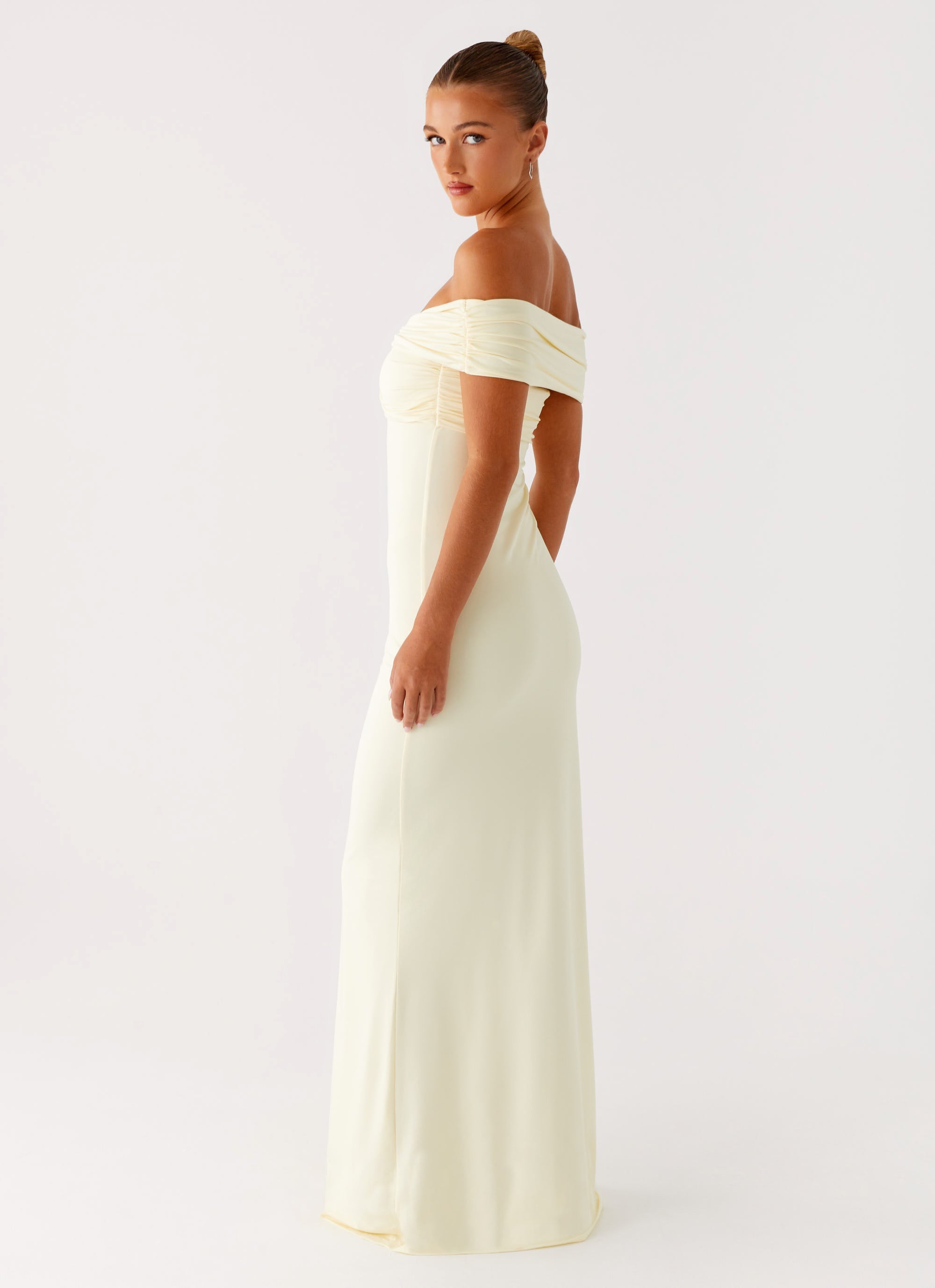 Cream off-shoulder maxi dress with ruched detailing and fitted silhouette — Peppermayo | Endless UAE
