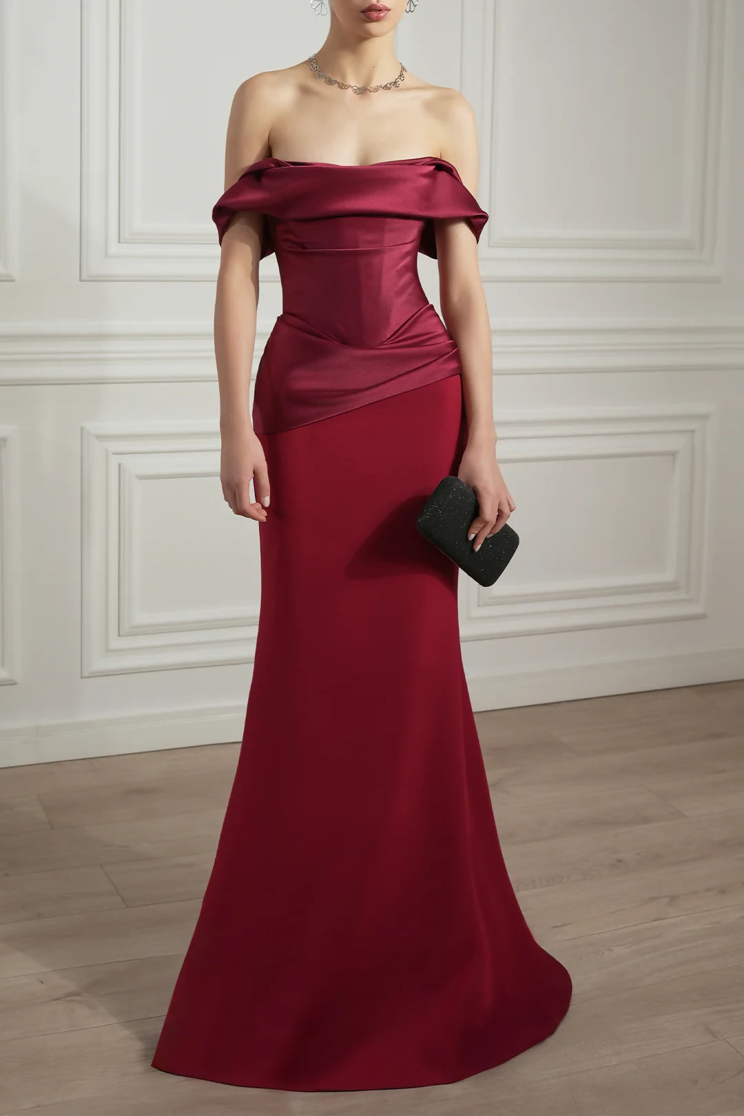 Elegant ruby red off-shoulder satin gown with draped bodice and mermaid silhouette — Rhea Costa | Endless UAE