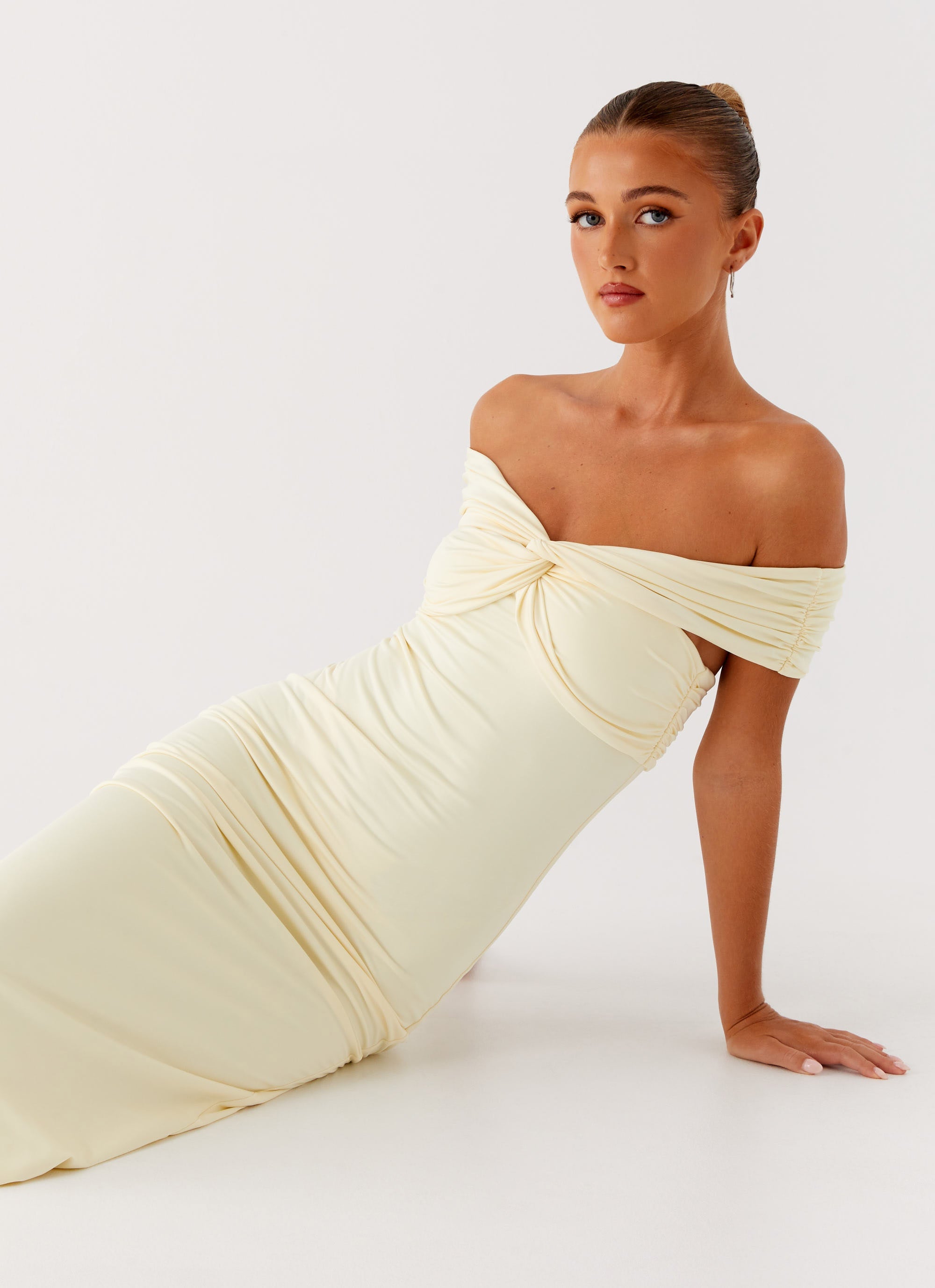 Cream off-shoulder maxi dress with ruched detailing and fitted silhouette — Peppermayo | Endless UAE