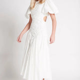 Woman wearing white Siren Drawstring Midi Dress with puffed sleeves and green strappy heels — Aje | Endless UAE