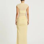 Pale yellow sleeveless maxi dress with cutout waist detail and ruched skirt — BENNI. | Endless UAE.