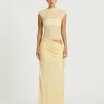 Pale yellow sleeveless maxi dress with cutout waist detail and ruched skirt — BENNI. | Endless UAE.