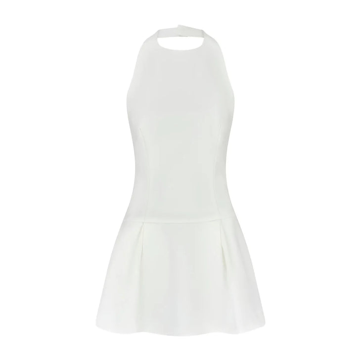 Sleeveless white mini dress with halter neckline and dropped flared hem on white background — Odd Muse | Endless UAE