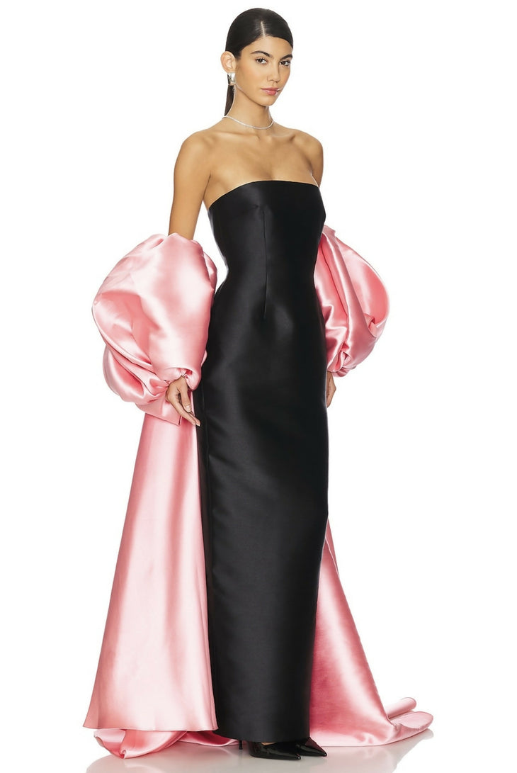 Black strapless maxi dress with dramatic pink puffed sleeves and detachable pink satin overlay — Solace London | Endless UAE