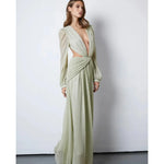 Woman wearing The Goddess Green Dress by Anne Louise Boutique — Endless UAE