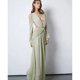 Woman wearing The Goddess Green Dress by Anne Louise Boutique — Endless UAE