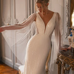 Embellished mermaid wedding dress with flowing cape and plunging neckline — Katy Corso Glen | Endless UAE