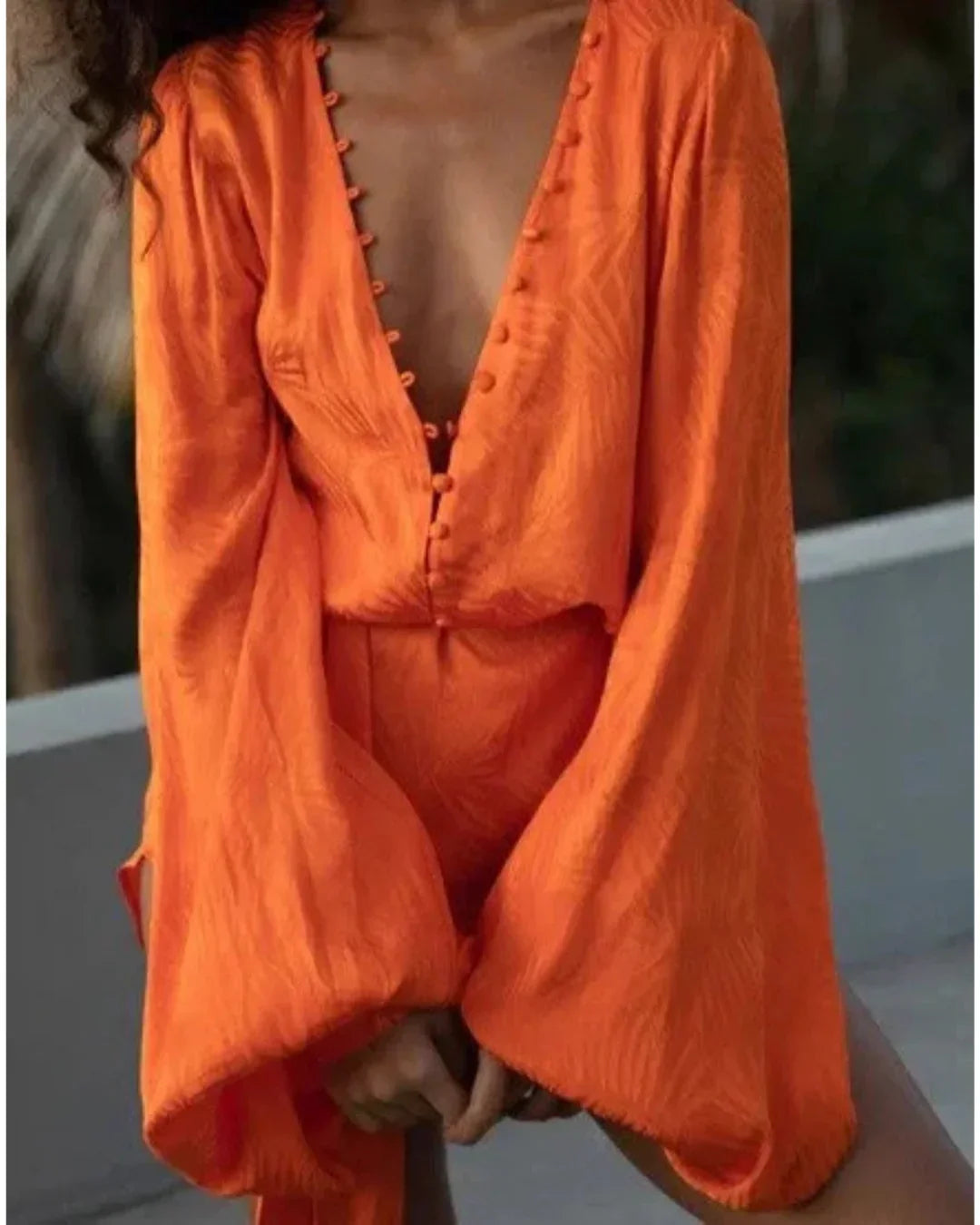 Vibrant orange V-neck dress with button detail and long sleeves — Rat & Boa | Endless UAE