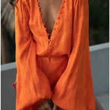 Vibrant orange V-neck dress with button detail and long sleeves — Rat & Boa | Endless UAE
