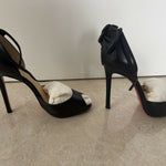 Black leather peep-toe platform pumps with bow detail and lace-up ankle straps — Christian Louboutin | Endless UAE