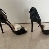 Black leather peep-toe platform pumps with bow detail and lace-up ankle straps — Christian Louboutin | Endless UAE