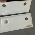 White leather shoulder bag with gold Jacquemus logo — Jacquemus | Endless UAE